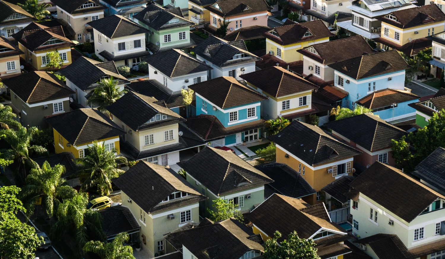 An aerial view of a neighborhood of houses.